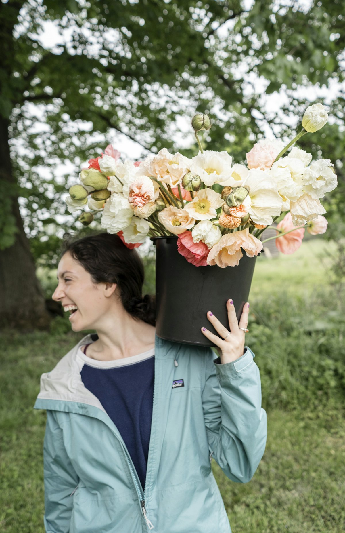 Florist holding a fresh seasonal bouquet